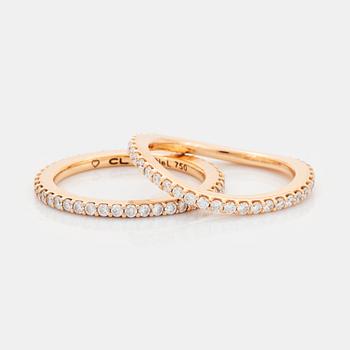 421. Ole Lynggaard two rings "Love" in 18K gold set with round brilliant-cut diamonds.