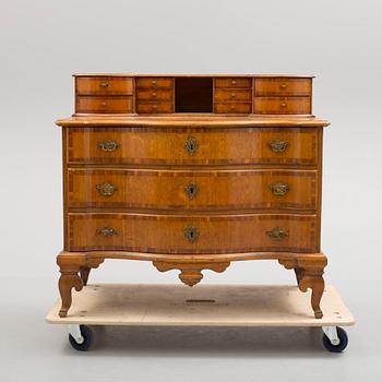 A late baroque chest of drawers.