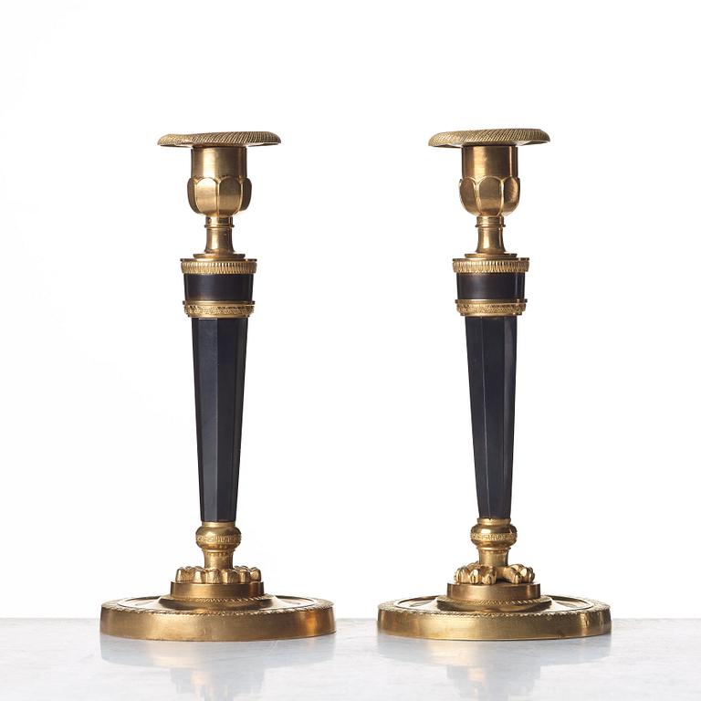 A pair of French Directoire candlesticks, circa 1800.