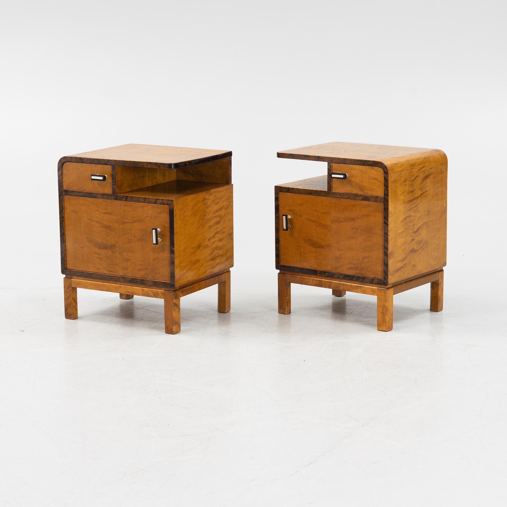 A pair of birch veneered 1930's bedside tables.