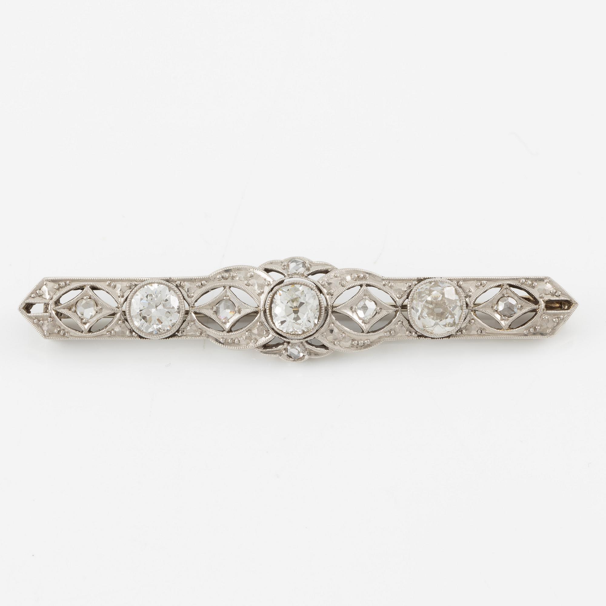 Brosch 14K guld med gammal- och rosenslipade diamanter.