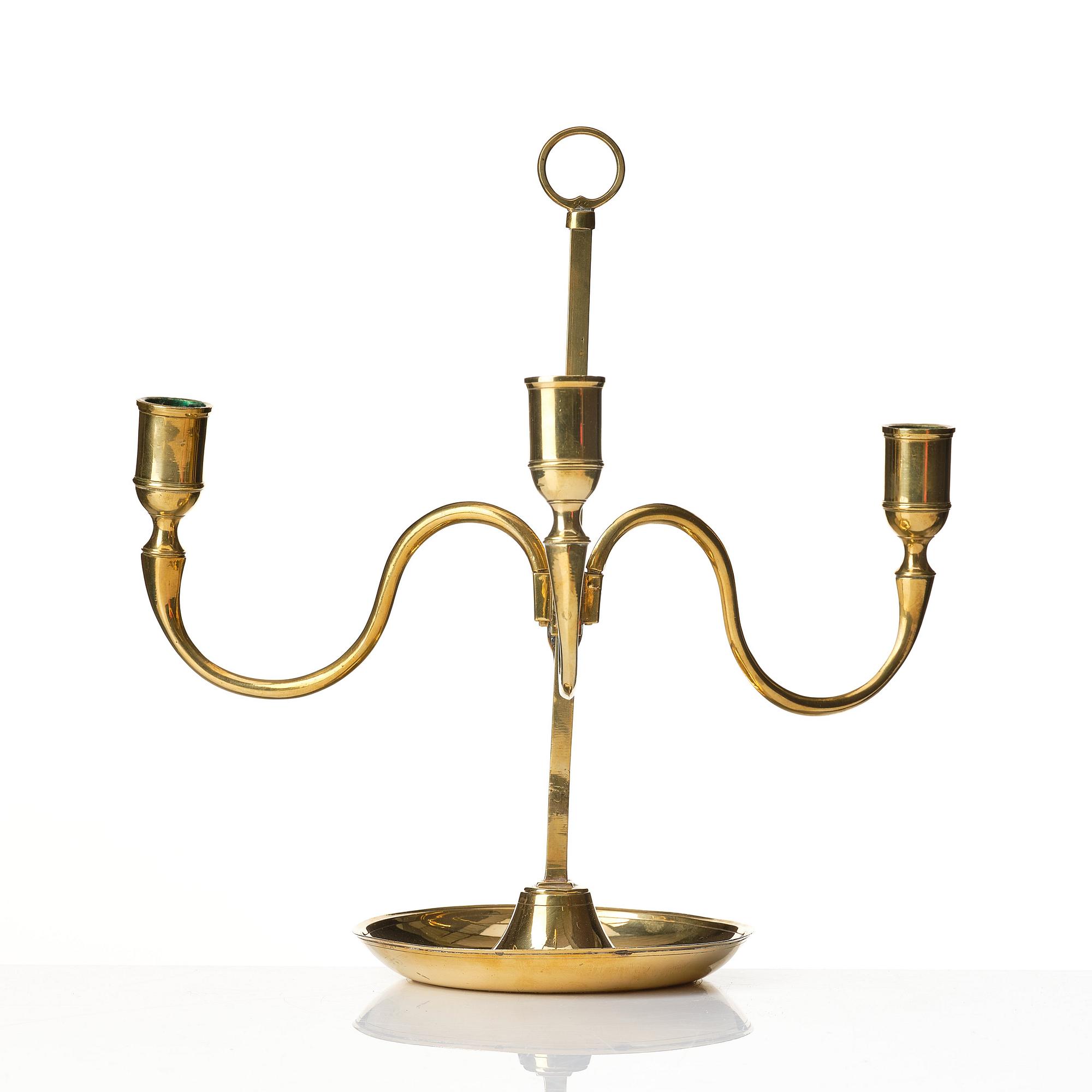 A Gustavian brass three light candelstick.
