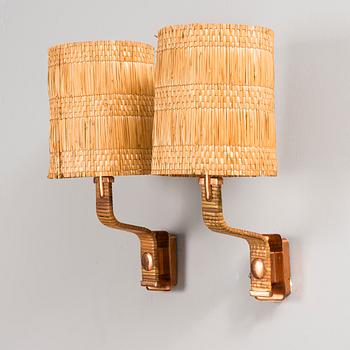 PAAVO TYNELL, A PAIR OF WALL LAMPS. Marked Taito. 1940-1950s.