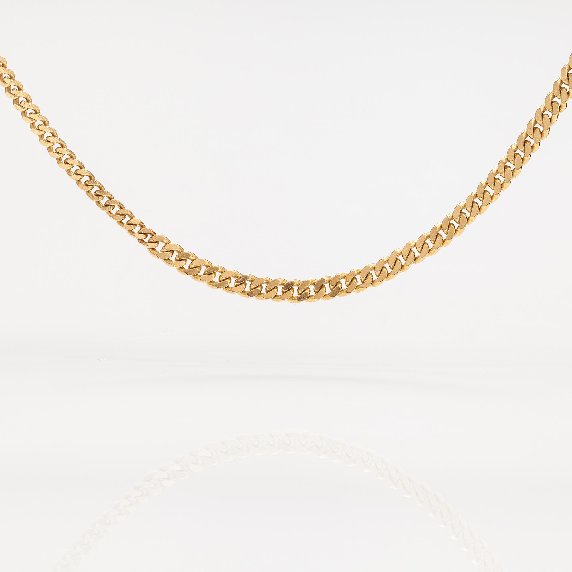 A 14K gold neckalce. Italy.
