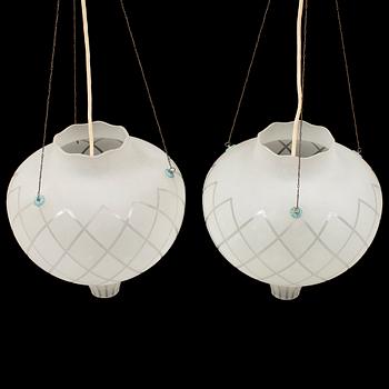 A pair of ceiling lights, probably 1940s.