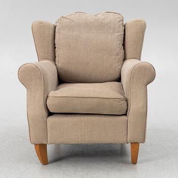 An armchair with footstool, Howard model, Englessons, 21st century.