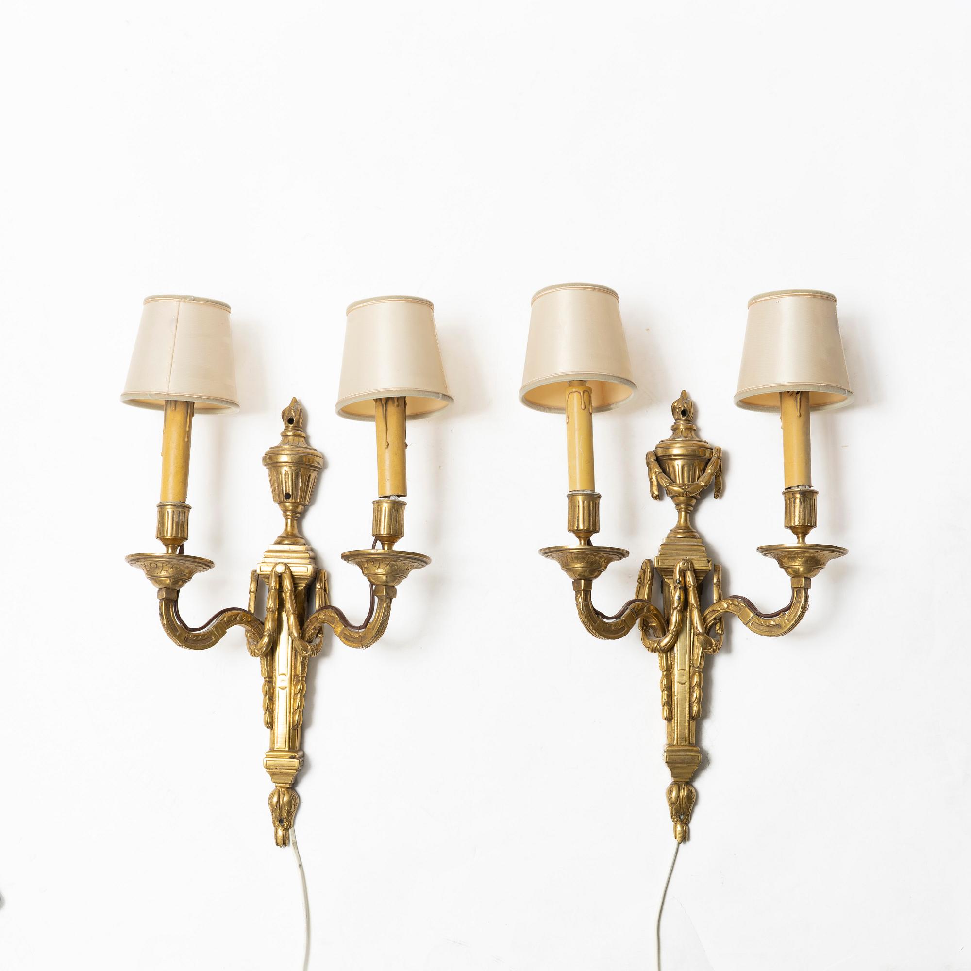 A pair of Louis XVI-Style sconses, 19th century.