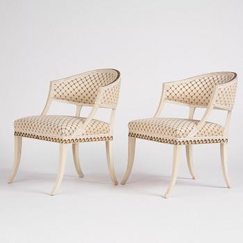 A pair of late Gustavian open-armchairs by E. Öhrmark (master in Stockholm 1777-1813).