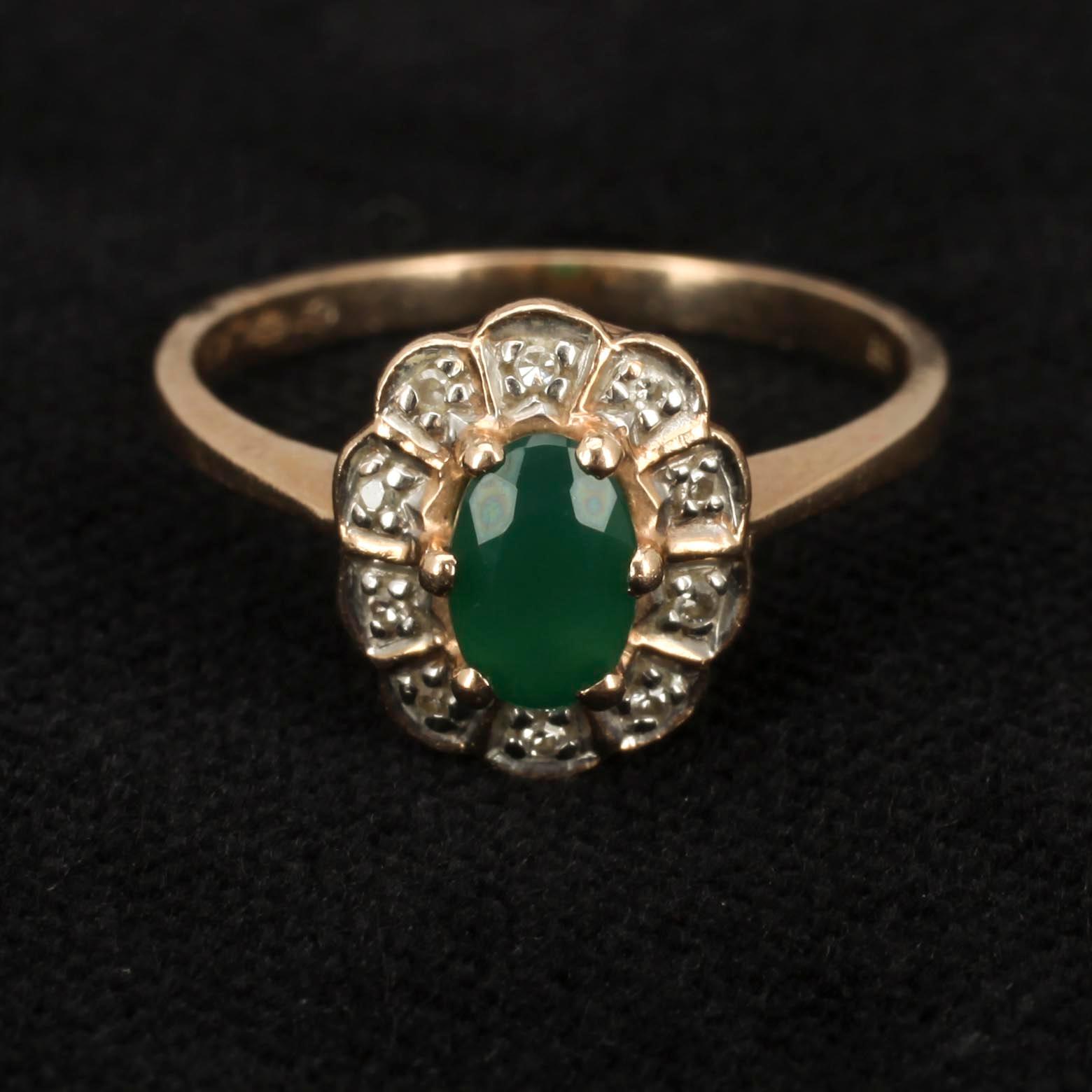 RING, guld 14K, smaragd med små diamanter. 1995. Vikt 2 g.
