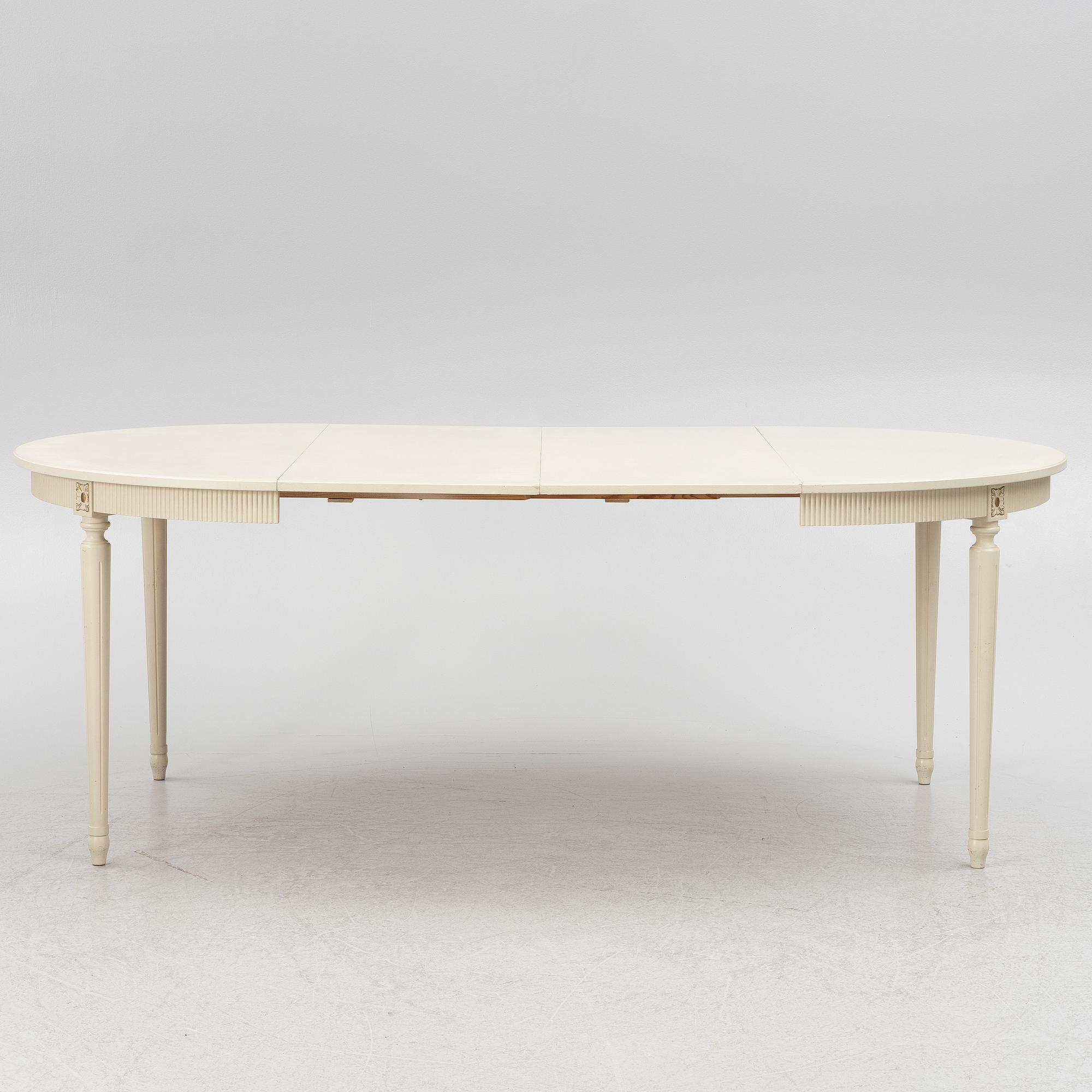 Dining table with six chairs, Gustavian style, second half of the 20th Century.