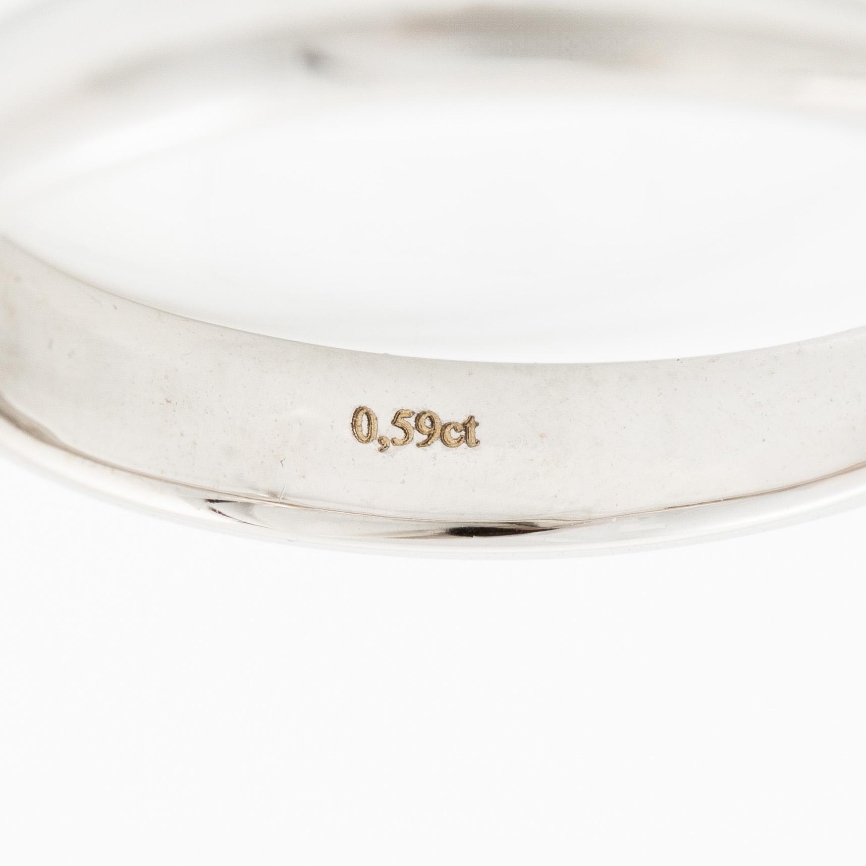 Ring 18K vitguld med briljantslipad diamant, medföljande IGI report.