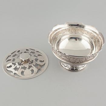 A silver lidded bowl by Cooper Brothers & sons in Sheffield, England, 1976.