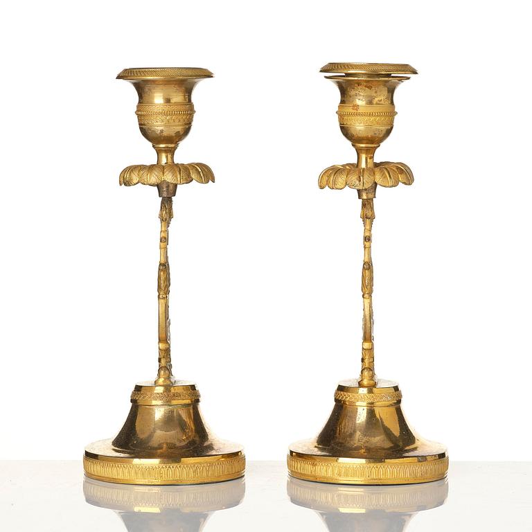 A pair of Swedish Empire ormula candlesticks.