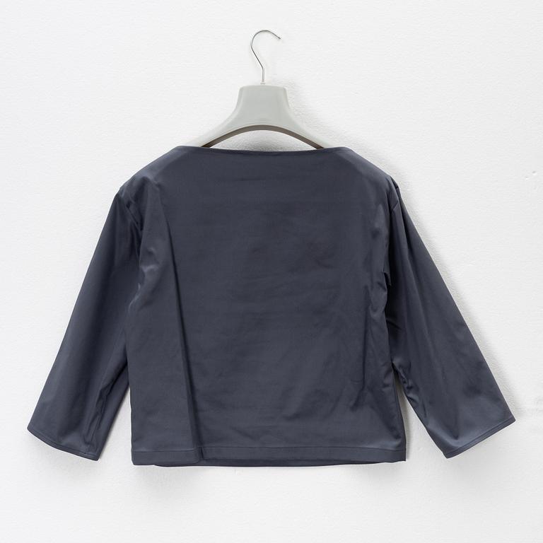Prada, A dark grey silk-mix skirt and top.