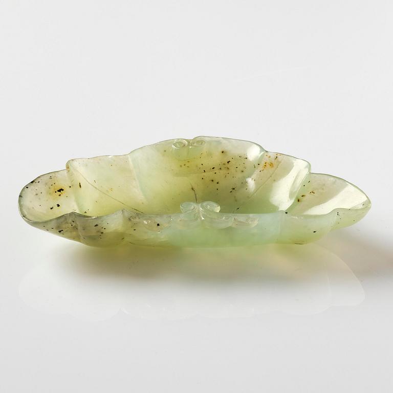 A carved nephrite ink palette, Qing dynasty.