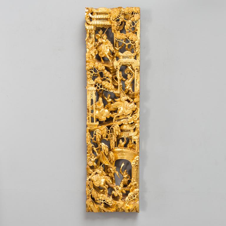 A Chinese carved and gilt wood panel, 20th century.