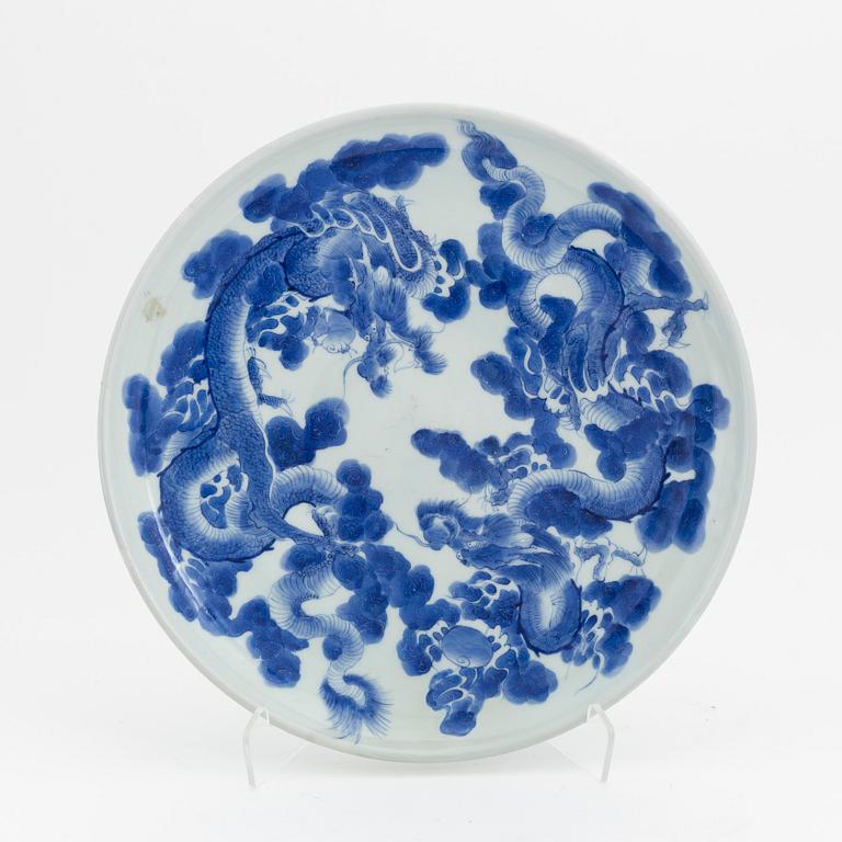 A blue and white large Japanese dragon dish, 20th century.