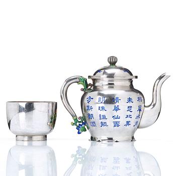 A tea pot with cover and a bowl, 20th Century.