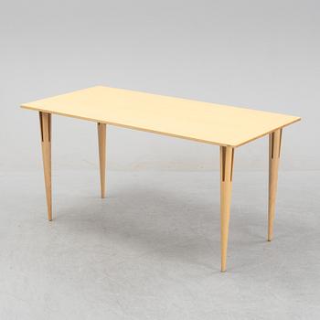 Bruno Mathsson, a birch-veneered dining table from Bruno Mathsson International.