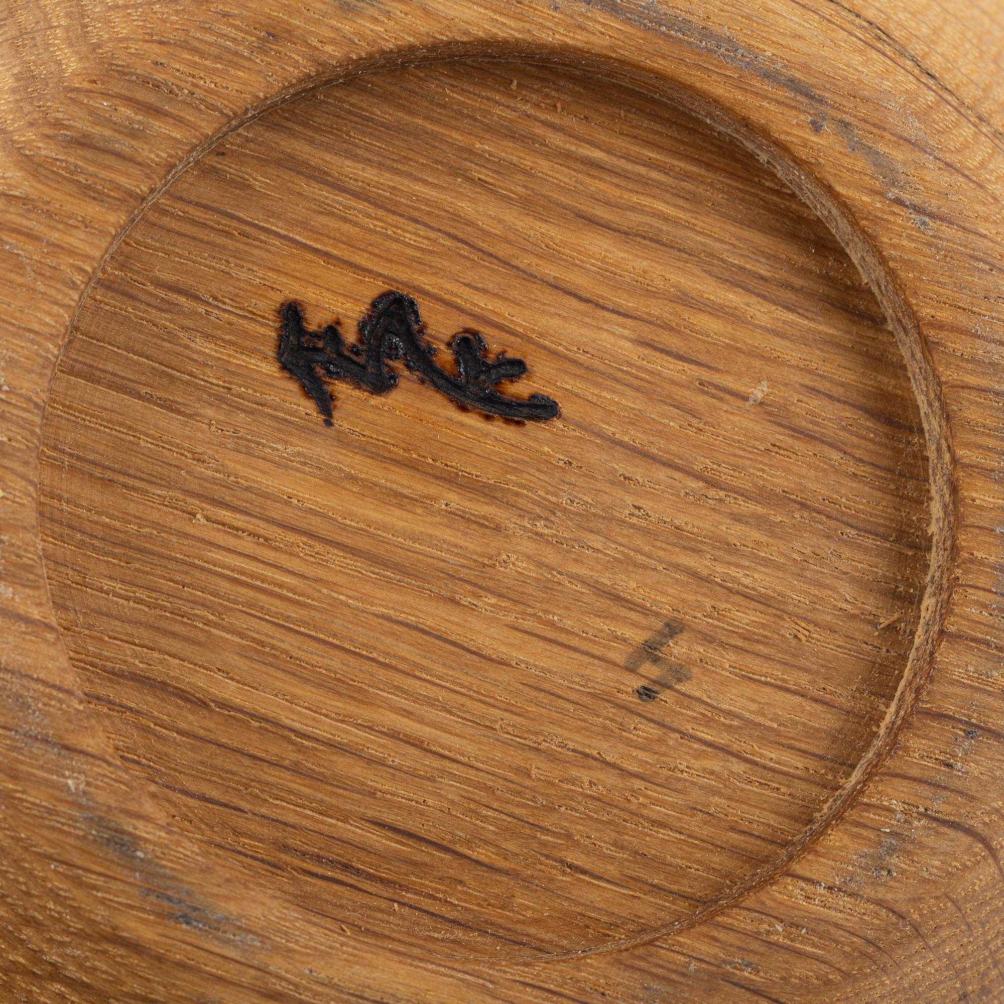 Magnus Ek, a set of three wood and silver snacks holders for Oaxen Krog.