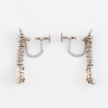 Opal and round brilliant cut diamond earrings.