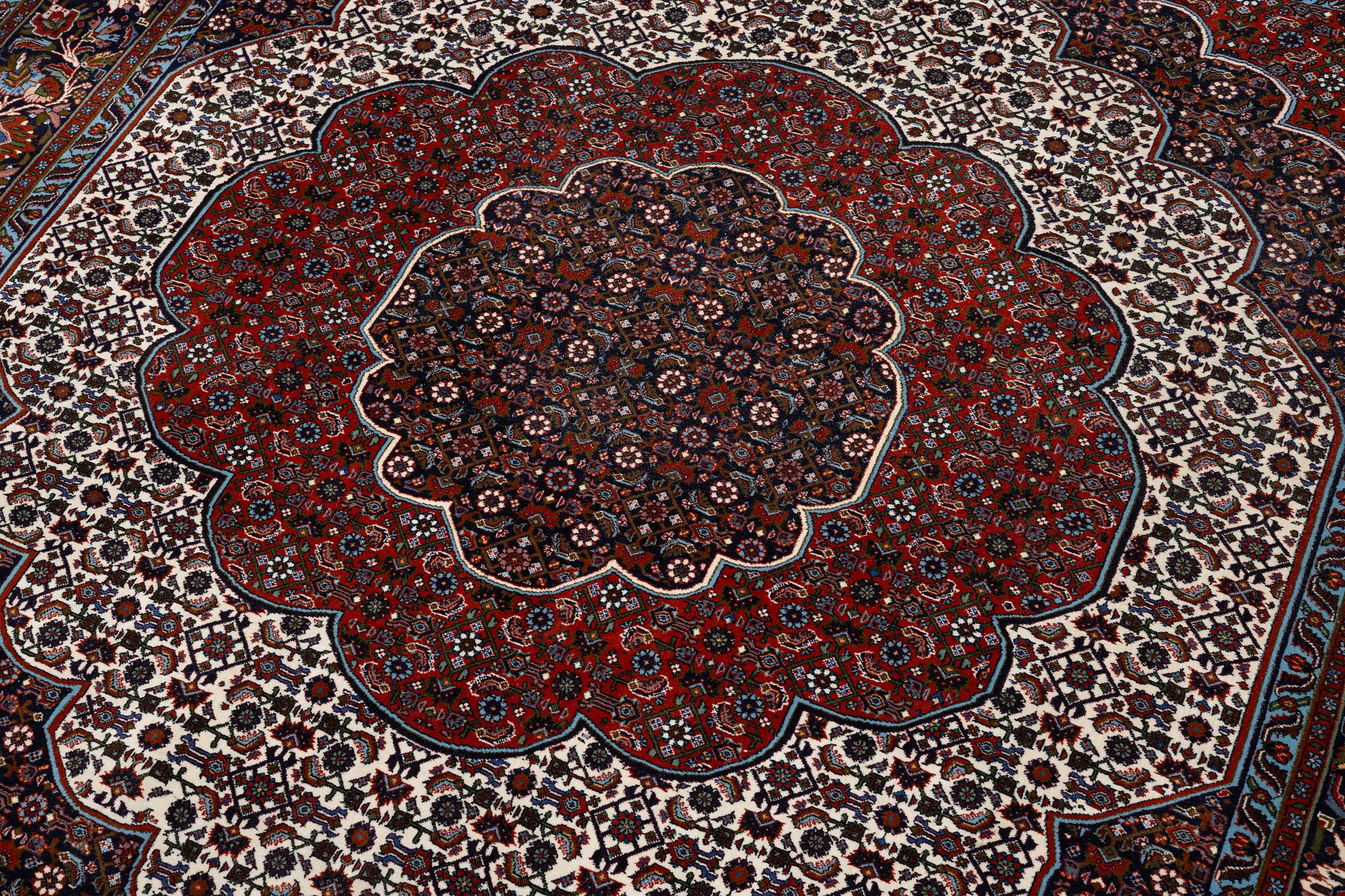 An Oriental rug, approx. 213 x 201 cm.