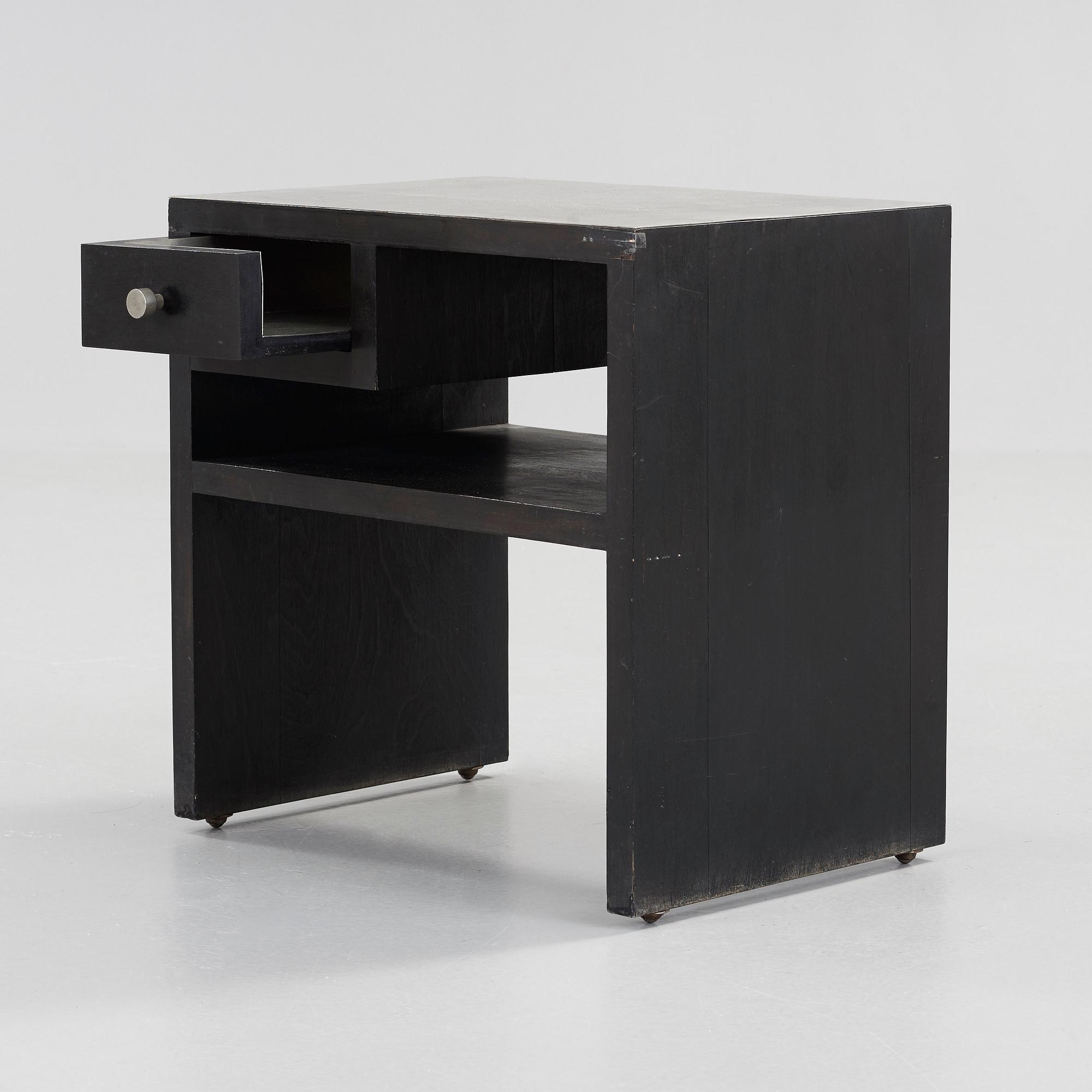 An Uno Åhrén black lacquered birch and pewter side table, Svenskt Tenn, Stockholm ca 1930.