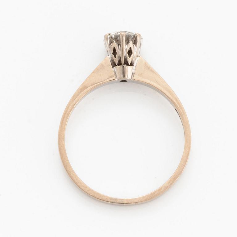 Brilliant-cut diamond solitaire ring.