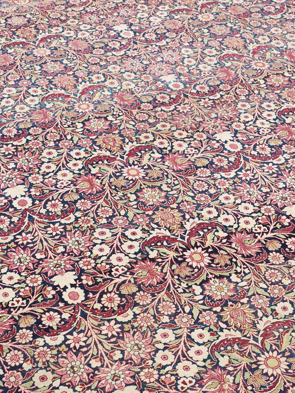 SEMI-ANTIQUE KERMAN LAVAR. 348 x 344 cm.