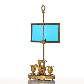 A Russian Empire ormolu and patinated bronse two-light lamp, early 19th century.