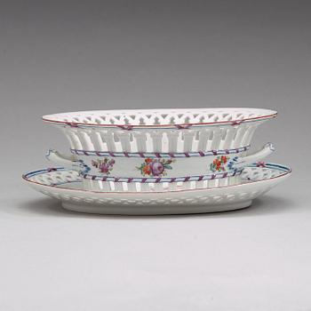 A Russian chesnut basket and stand, Imperial Porcelain Manufactory, St Petersburg, period of Alexander I (1801-25).