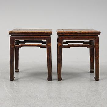 A pair of hardwood tables, 20th century.