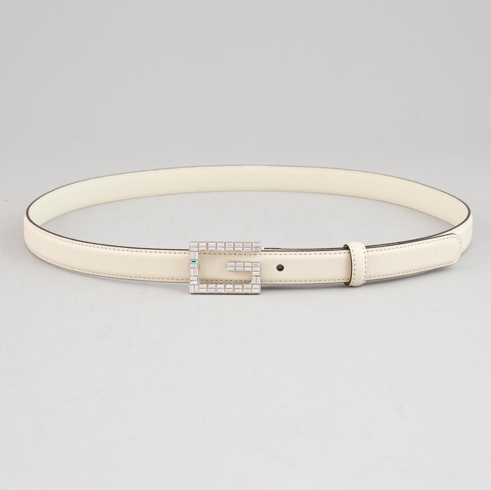 Gucci, a white leather belt, size 90 36.