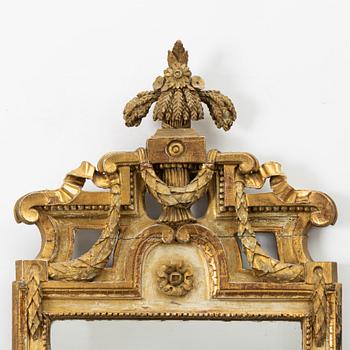 A Gustavian giltwood mirror by J. Åkerblad (master in Stockholm 1758-99).