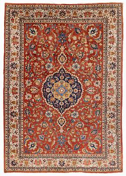 A oriental carpet, ca 320 x 223 cm.