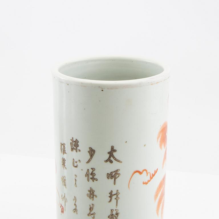 A brush vase decorated in red with buddhist lions and calligraphy, early 20th century.