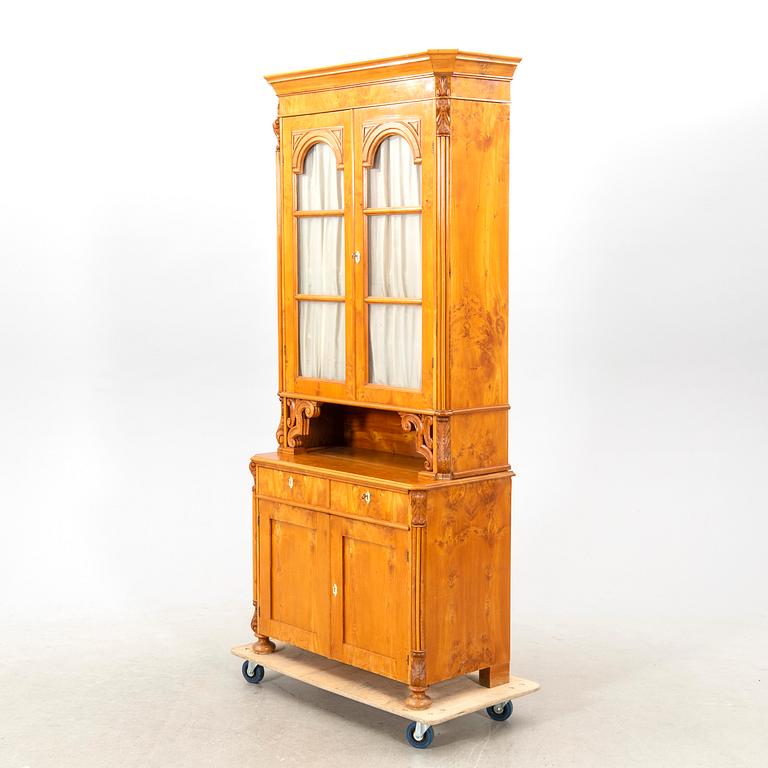 A Neo Rococo elm mid 1800s display cabinet.