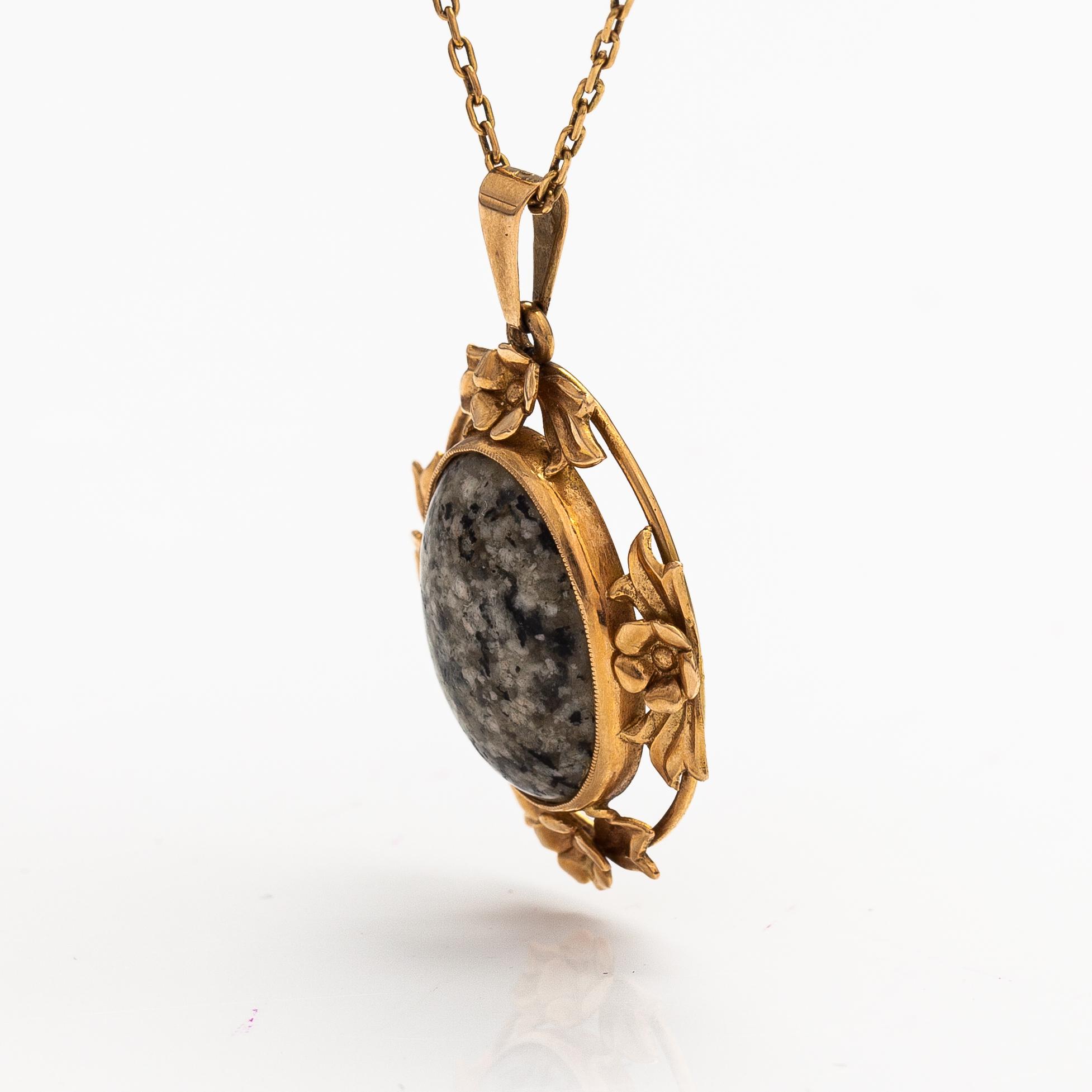 Halsband,14K guld och granit. Auran kultaseppä, Åbo.