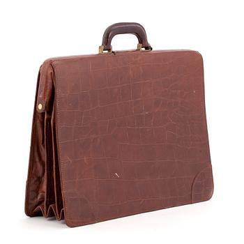 MULBERRY, a brown leather embossed briefcase.