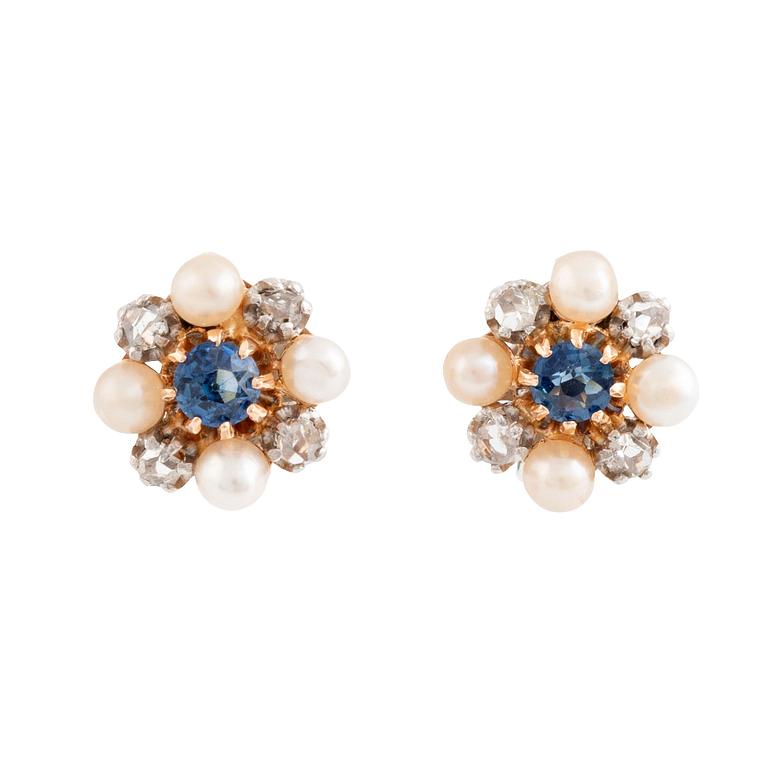 A pair of 18K gold and silver earrings set with rose-cut diamonds, pearls and blue stones.