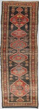 A runner carpet, ca 292 x 105 cm.