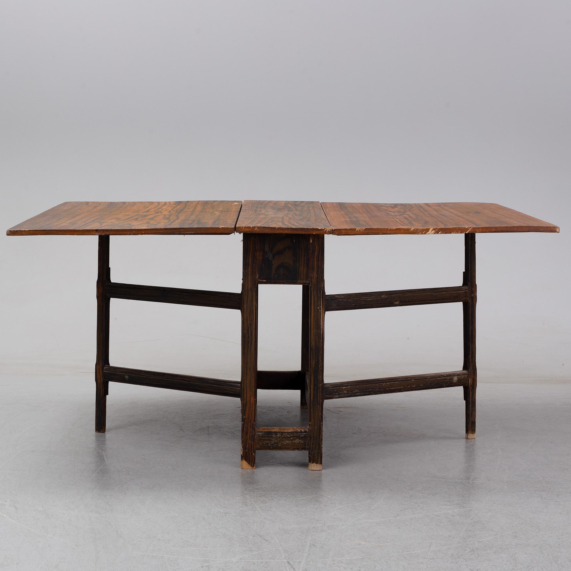 A 19th Century painted gate leg table.