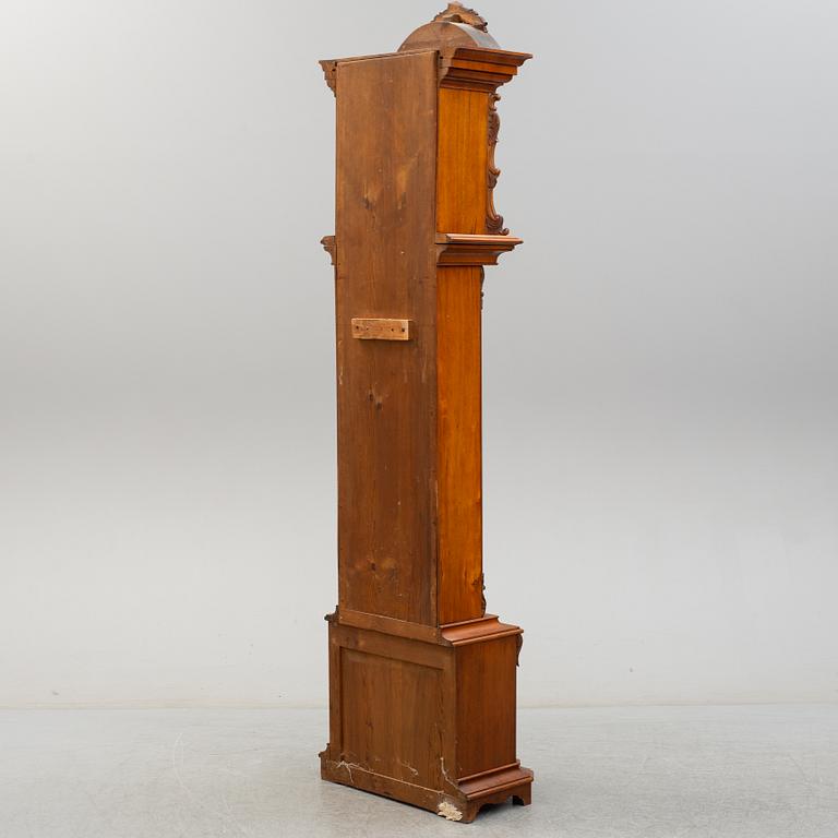 A 18th century long case clock.