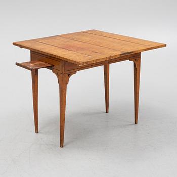 A birch card table, 19th Century.