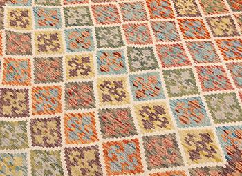A Kilim rug, approx. 253 x 168 cm.