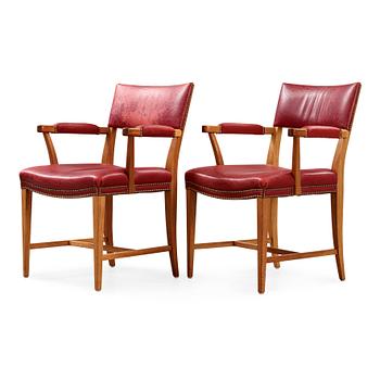 Josef Frank, a pair of mahogany and red leather armchairs, Svenskt Tenn,