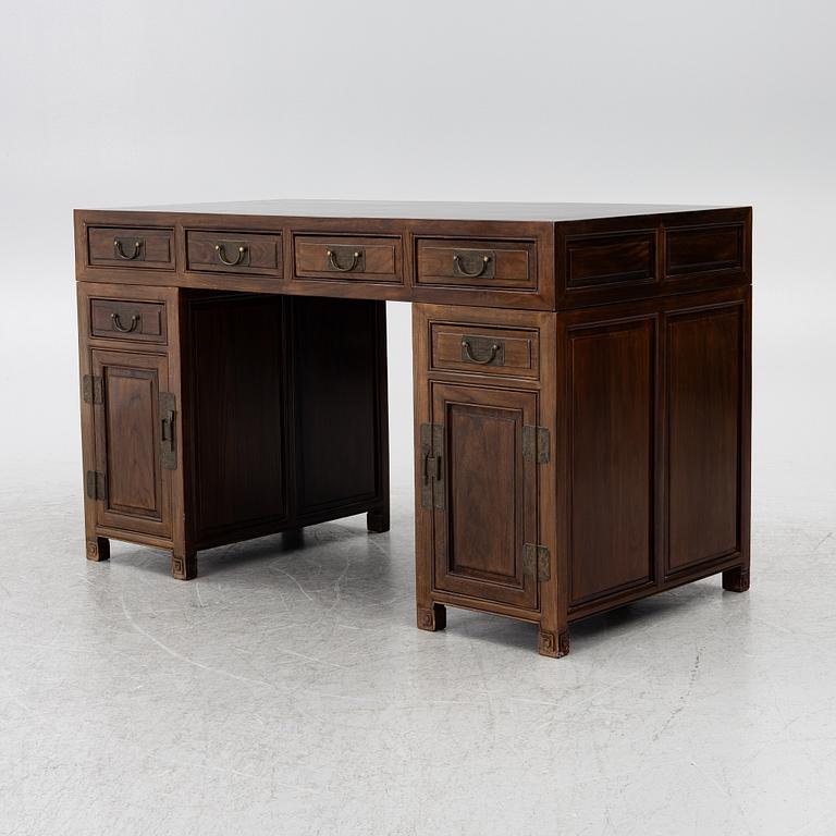 A Chinese hardwood desk, 20th century.