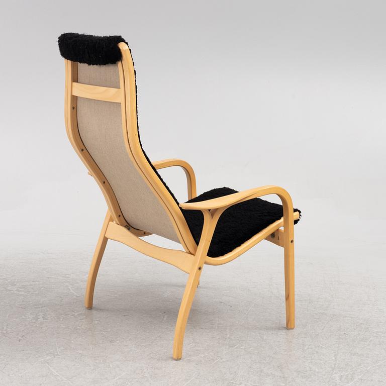 Yngve Ekström, an armchair and a footstool, "Lamino", Swedese, second half of the 20th century.