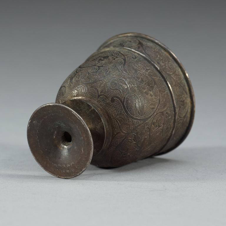 A silver stemcup, presumably Tang dynasty.