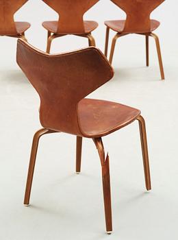 Three Arne Jacobsen teak and brown leather 'Grand Prix' chairs, Fritz Hansen, Denmark 1950's-60's.